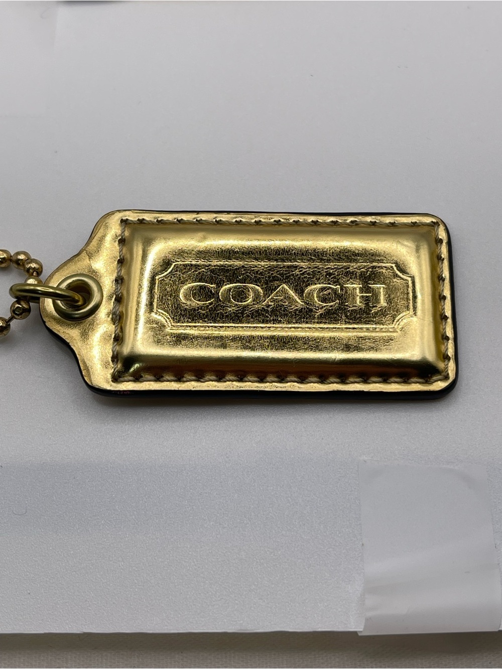 Coach Metallic Gold Leather Hang Tag